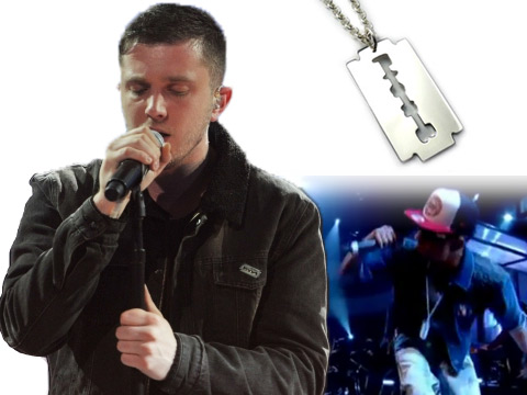 Plan B on stage performing with his lapel pin badge and dog tag