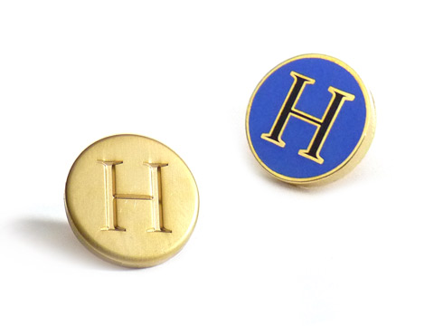 branded metal pins